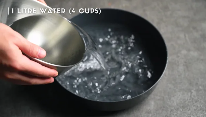 In a pot, combine water, dry sardines, and dry kombu. Let it soak at room temperature for 30 minutes.