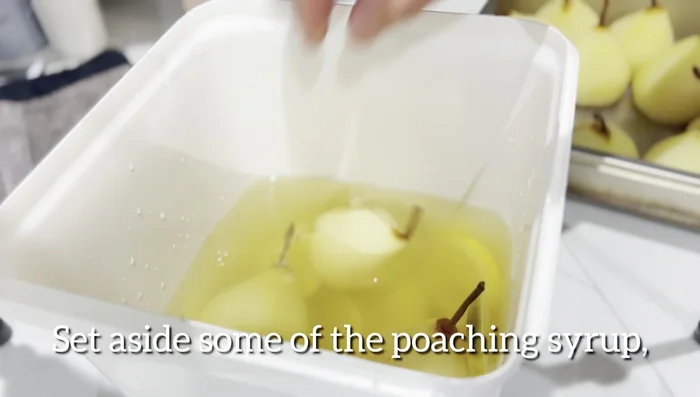 Add another 2 cups of Jumbai sake to the remaining syrup. Set aside some of the poaching liquid for a glaze.