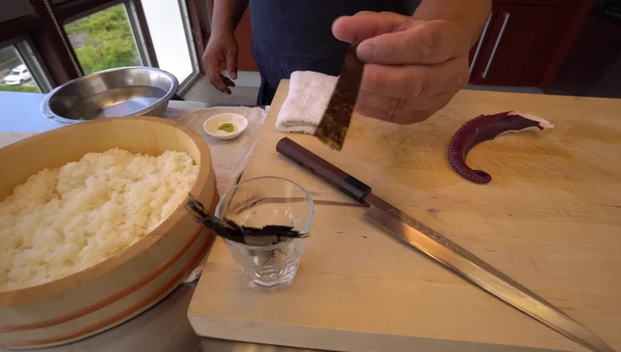 Add wasabi (optional): Place a small amount of wasabi on the octopus before placing it on the rice. (20.609)