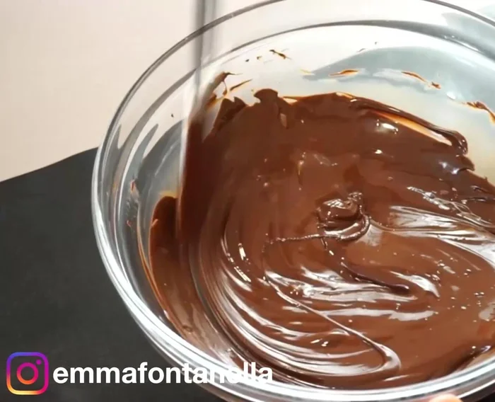 Melt chocolate in microwave (stirring every 40 seconds) or double boiler. Combine with cream (or condensed/whole milk) until smooth.