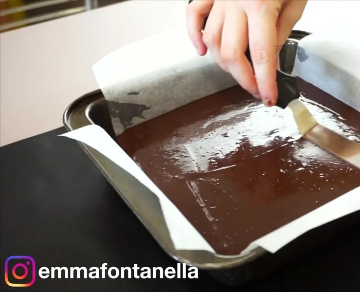 Pour mixture into a parchment-lined pan and chill in the fridge until hardened.