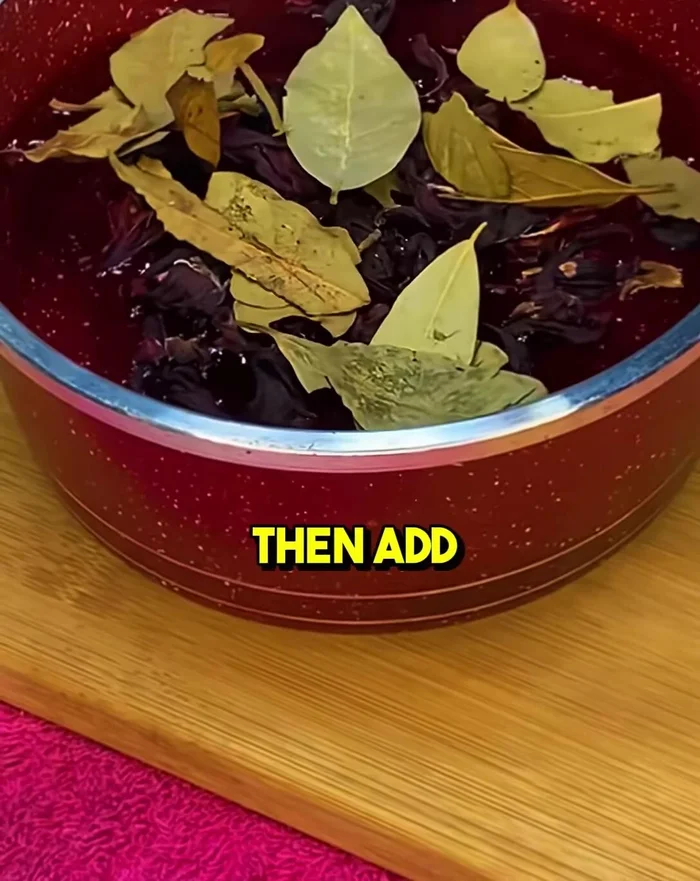 Add five bay leaves.