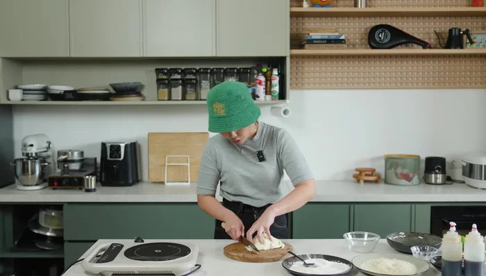 Cut the cabbage (and carrots, if desired).