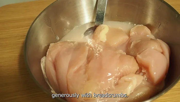 Dip marinated chicken in batter, then coat generously with breadcrumbs.