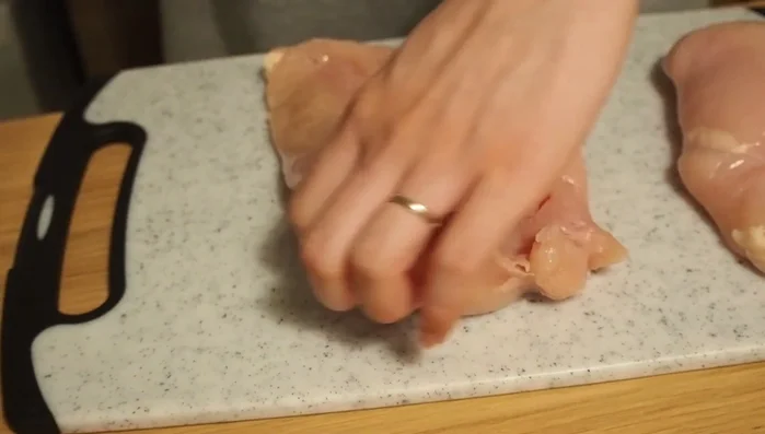 Remove skin from chicken breasts and butterfly them. Cover with plastic wrap and pound until even thickness.