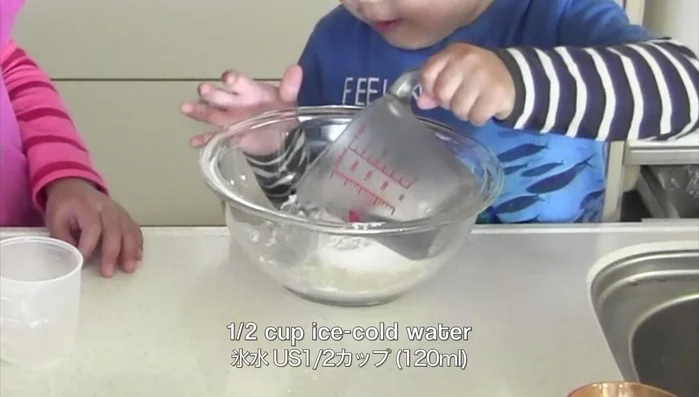 Make the batter: Add ice-cold water to the flour, ensuring a lumpy consistency. Do not overmix.