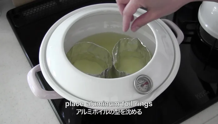 Heat the oil. Place the foil rings in the hot oil. Add the vegetable mixture to the rings, a little at a time.