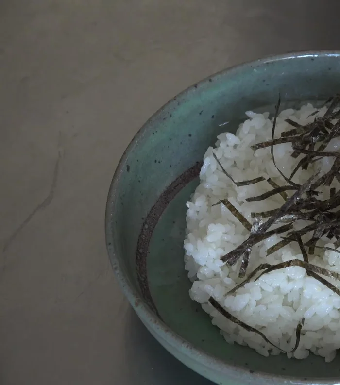 Assemble Chirashi Sushi: Place sushi rice on a plate or bowl. Add shredded nori. Arrange all prepared ingredients on top, using shiso leaves and cucumber as dividers.