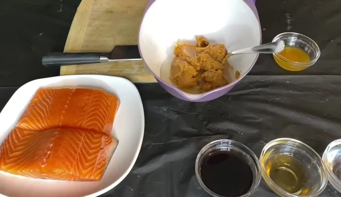 Prepare the marinade: In a bowl, combine miso paste, mirin, soy sauce, sugar, sake, and rice wine vinegar. Mix until smooth.