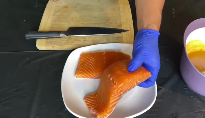 Prepare the salmon: Make diagonal cuts on the salmon fillets (skin-on recommended) to help with marinating and create a crispy crust during cooking.