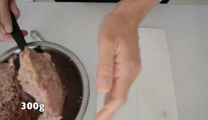 Shape the ground beef into a patty, removing air inside to prevent it from falling apart while cooking.
