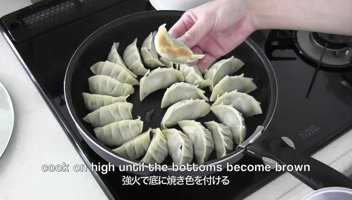 Cook on high heat until bottoms are brown. Add water, cover, and steam until cooked.