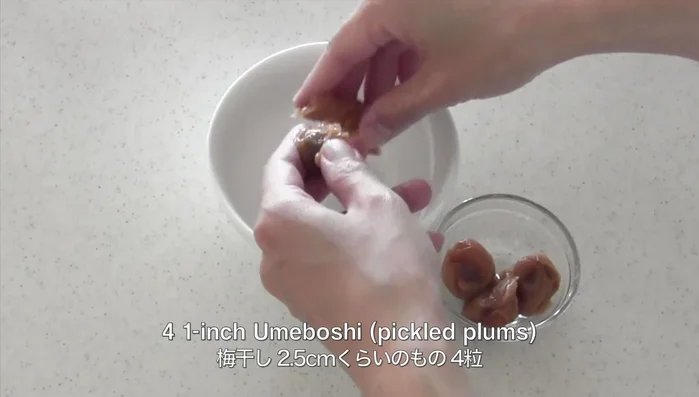 Remove seeds from umeboshi and chop.
