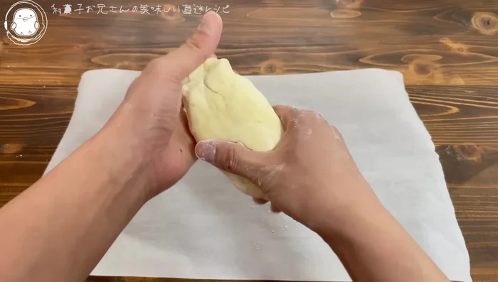 Shape the dough into a long, thin loaf resembling a French baguette.