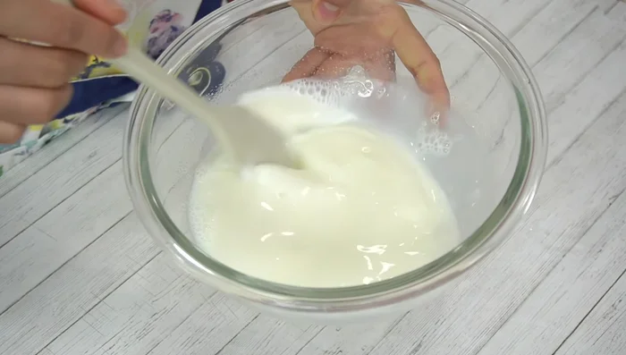 Gradually add the milk-gelatin mixture to the yogurt, mixing well to avoid lumps. Add lemon juice at the end.