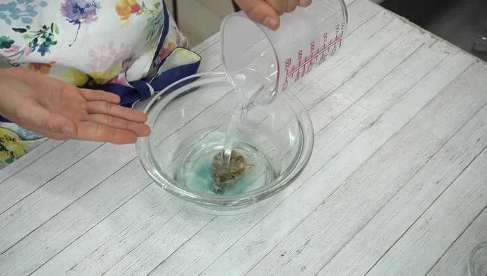 Steep butterfly pea tea bag in hot water for 2 minutes.