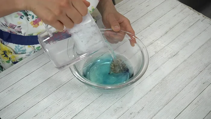 Steep butterfly pea tea bag in hot water for 2 minutes.