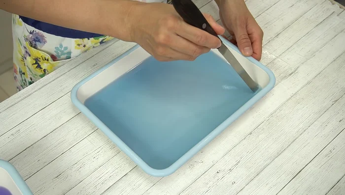 Once all layers are set, cut the blue and purple jellies into desired shapes (dice or crushed).