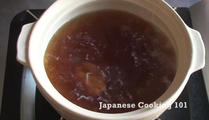 Cook chicken in the broth.
