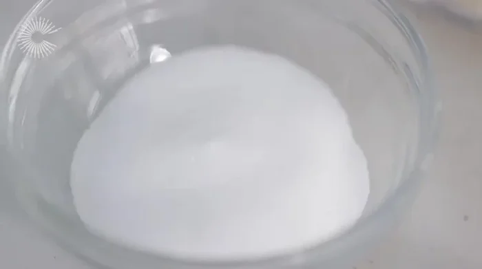 While the rice cooks, prepare the sushi rice vinegar mixture by combining rice vinegar, sugar, salt, and kombu. (113.83)