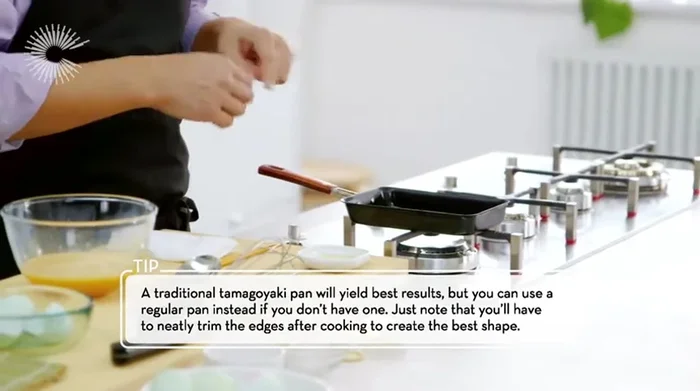 Heat a rectangular pan with a little oil. Pour a thin layer of egg mixture, cook until set but still soft. (230.8)