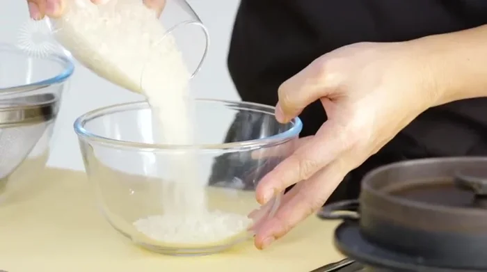 Wash the rice 4-5 times until the water runs clear to remove starch. (23.699)