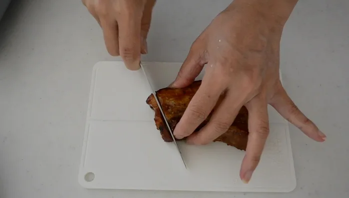 Slice chashu pork to your desired thickness.