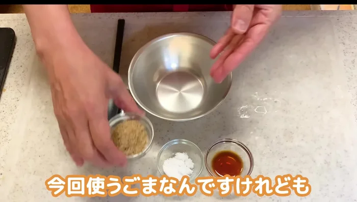 Prepare the sesame coating: Mix ground sesame seeds, sugar, and soy sauce until well combined. The soy sauce adds moisture, making it easier to mix with the mochi later.