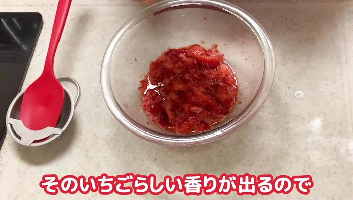 Add sugar to the mashed strawberries to help release their juice.