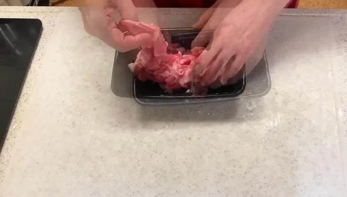 Marinate the pork with soy sauce and potato starch. Break up any large pieces.