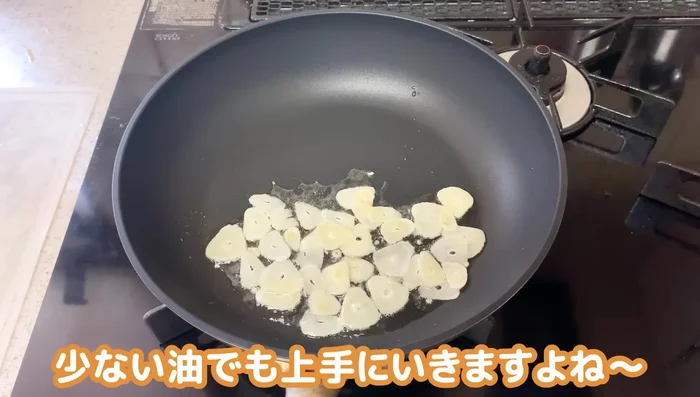 Fry garlic chips until golden brown, flipping halfway. Remove and drain on the prepared tray.