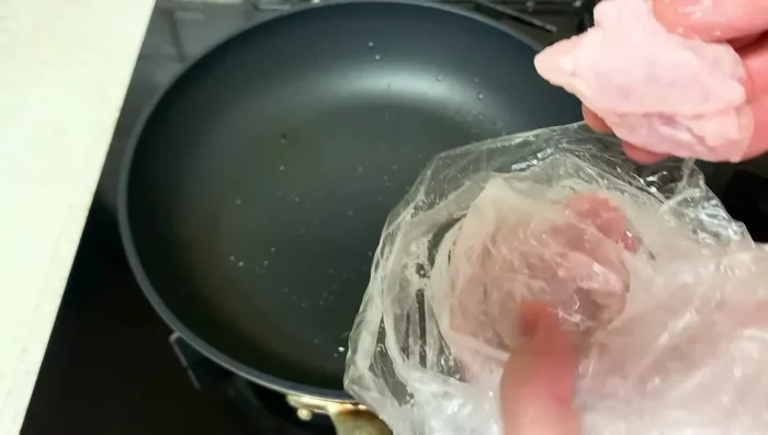 Fry chicken thighs skin-side down in the garlic-infused oil, for about 5 minutes, until skin is crispy.
