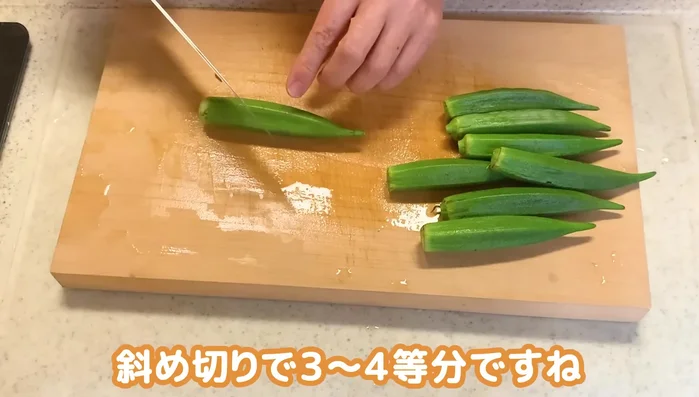 Cut the onion diagonally into 3-4 equal parts. The speaker mentions the benefits of this cutting method for texture and even cooking.