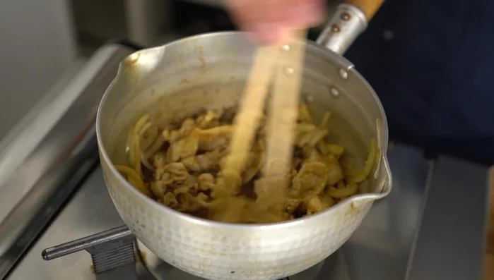 Add the noodle soup (adjust amount as needed), water, and milk. Add dried bonito powder for flavor.