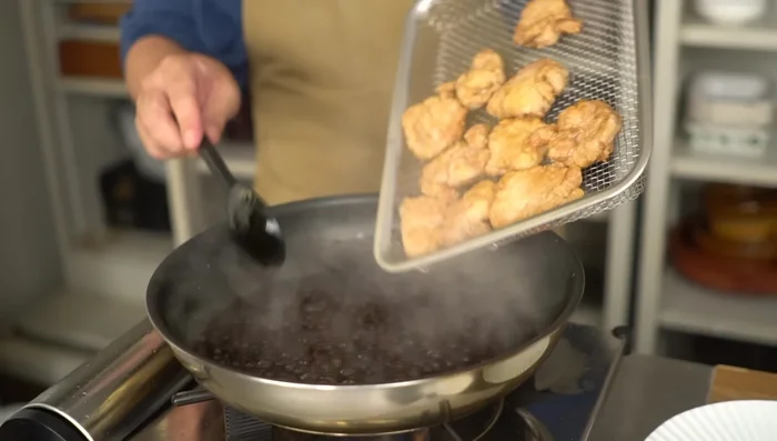 Add the fried pork to the sauce and toss to coat.