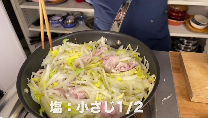 Add salt, sugar, and water. Cover and simmer until the cabbage softens.