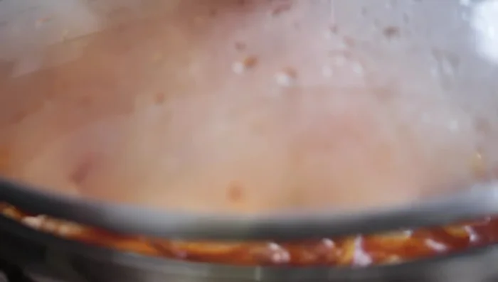 After 3 minutes, open the lid and stir. Continue cooking for another 3 minutes.