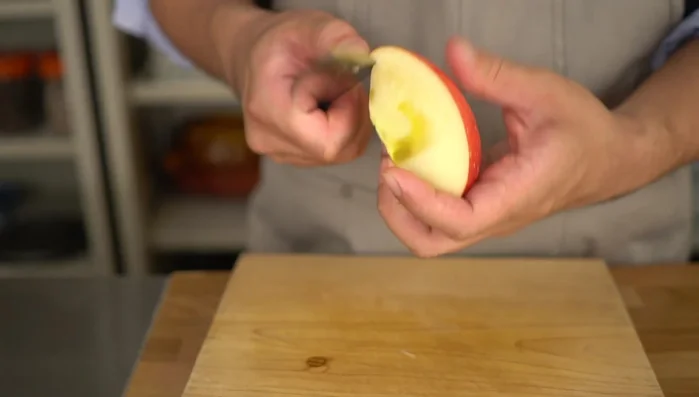 Peel and thinly slice the apple skin diagonally.