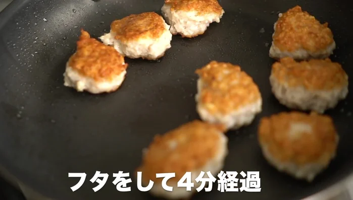 After 4 minutes of baking, check the meatballs. Flip again, and cook until crispy on both sides.