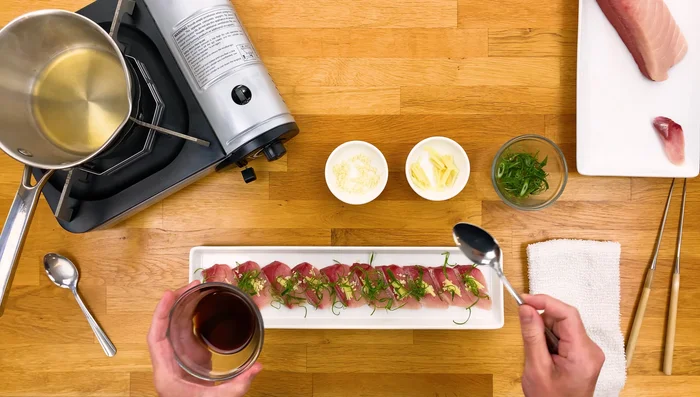 Drizzle ponzu sauce over the fish.
