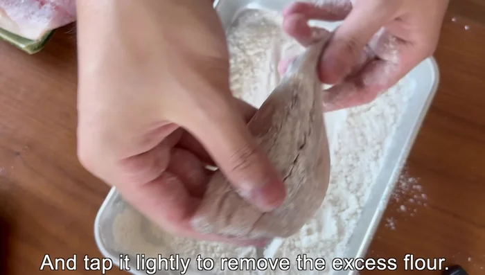 Dredge the fish fillets in cake flour, then egg, and finally breadcrumbs, ensuring the breadcrumbs adhere well to all sides.