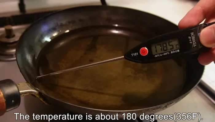 Deep fry the fish in hot oil (around 180°C) for 4-5 minutes, or until golden brown and crispy. Turn halfway through.