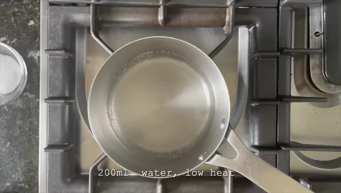 Make the Dashi: In a pot, combine 200 mL of water, 1 teaspoon of dashi powder, 1 tablespoon of sugar, 1 tablespoon of soy sauce, and a pinch of katsubushi. Simmer over low heat.