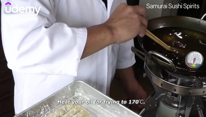Heat the oil to 170°C (338°F). You can check the temperature by inserting chopsticks – bubbles should rise from the tip.