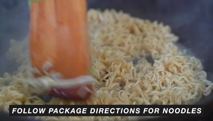Add the flavor packet (or homemade yakisoba sauce). If using fresh noodles, add them directly to the pan with the other ingredients and stir-fry.