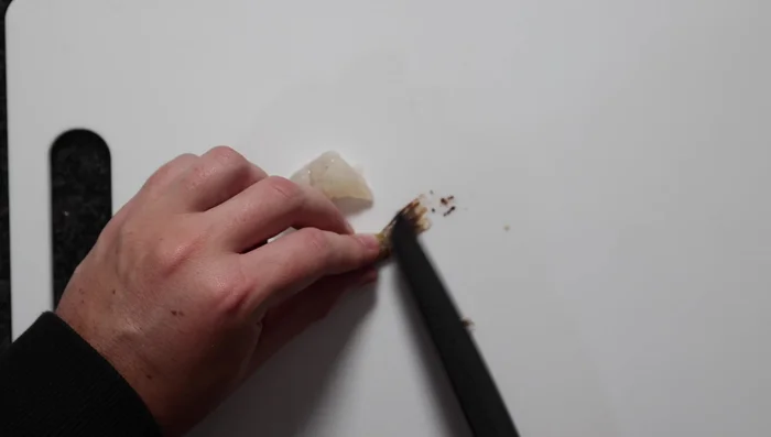 Prepare the prawns: Clean the dark part of the tail, cut the very end, make shallow diagonal slices along the belly, and gently squeeze to straighten them.