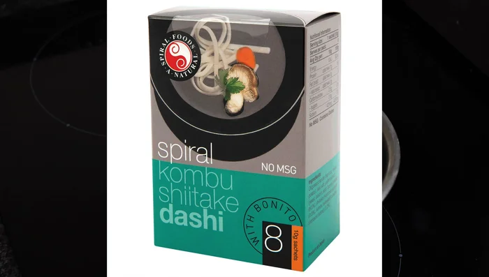 Prepare the udon soup: Add Dashi powder to a pan with 1 cup of water, simmer, and dissolve. Add Bonito flakes (optional), mirin, rice wine vinegar, and soy sauce. Taste and adjust seasoning.