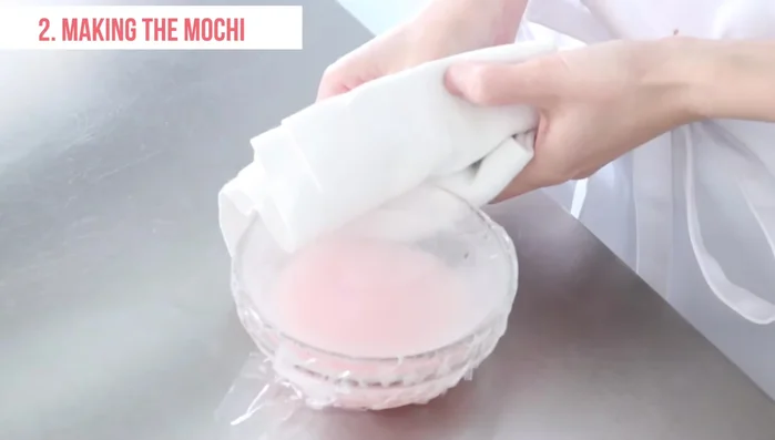 Microwave the mixture for 2 minutes, then add sugar, stir, and cover with plastic wrap again. Microwave for another 10 minutes.