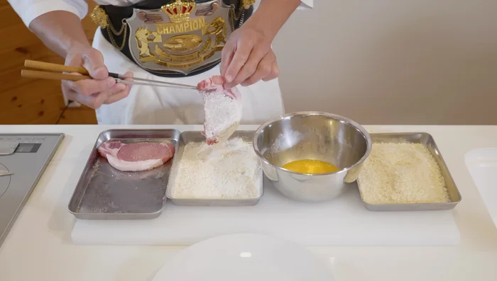 Bread the pork: Coat in flour, then dip in beaten egg, and finally coat in panko breadcrumbs, pressing firmly to adhere.