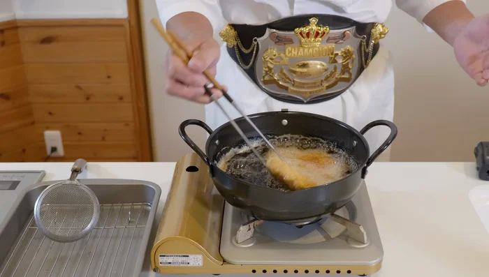 Check for doneness: The pork should be golden brown and bubbles should start to get smaller. Remove and let oil drip off.